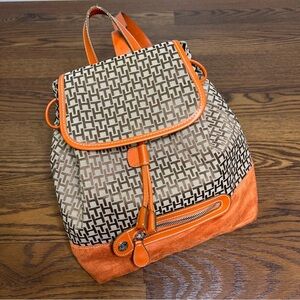 Tommy Hilfiger backpack in orange and brown with a monogram logo print